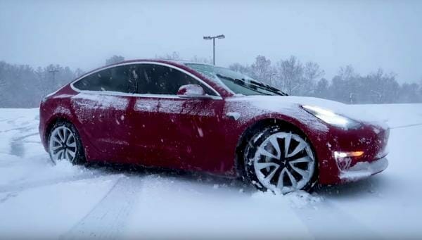 tesla model 3 in snow