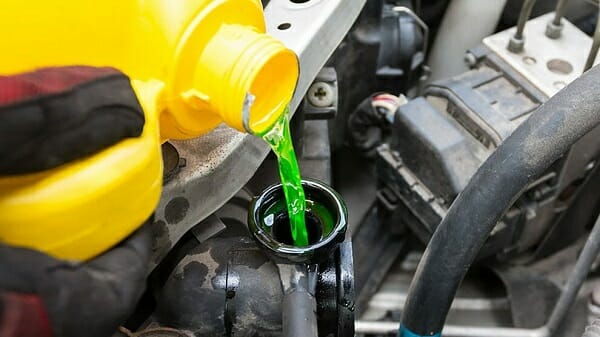 pouring antifreeze